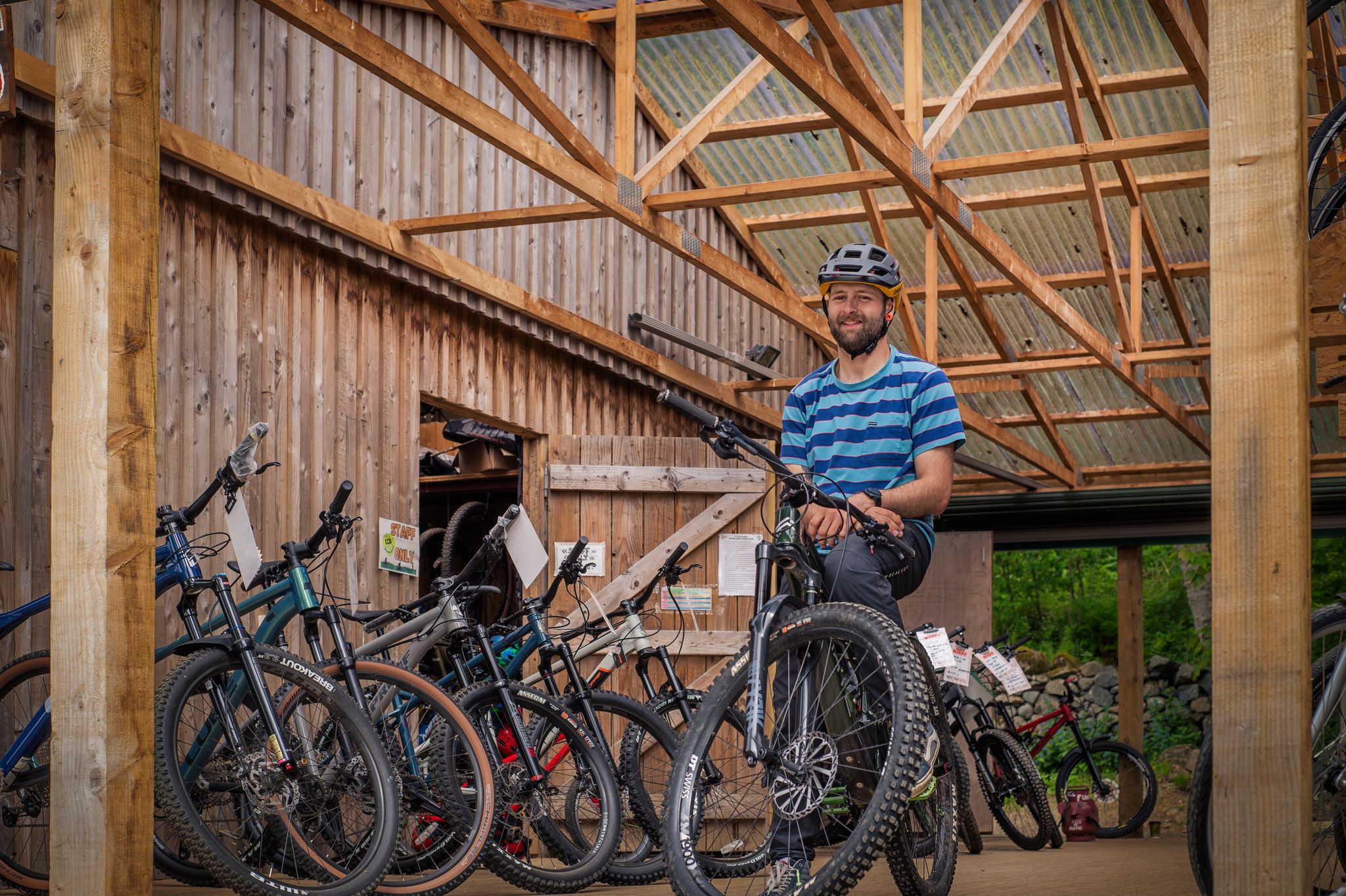 Getting mountain bikes ready in shed