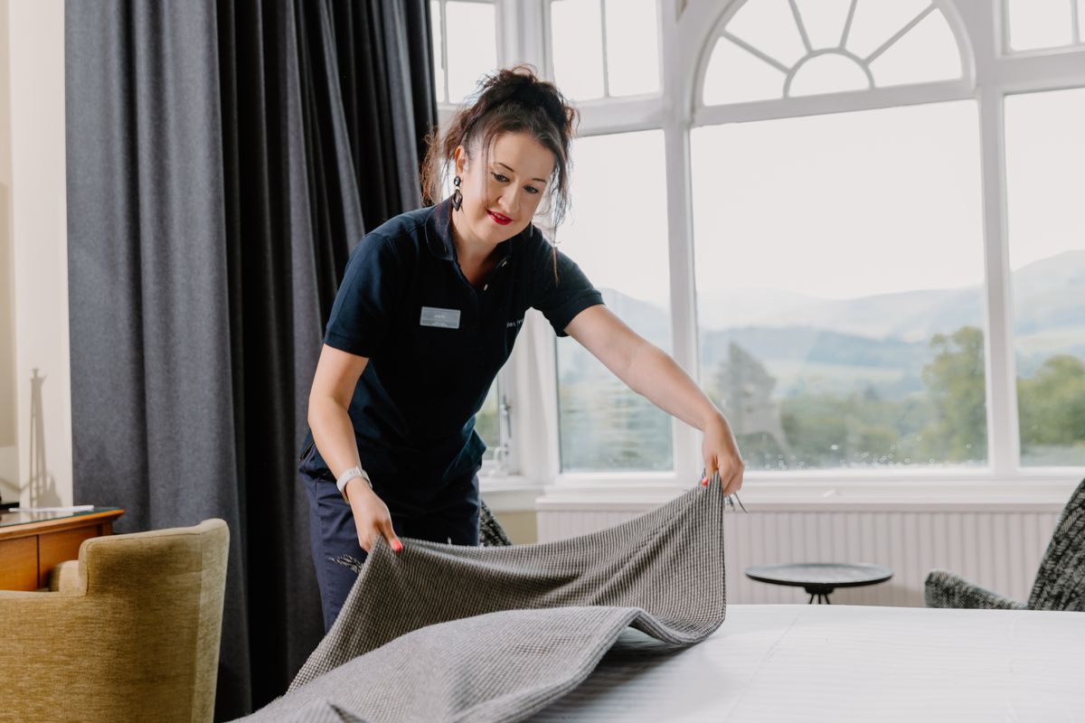 Person making a bed