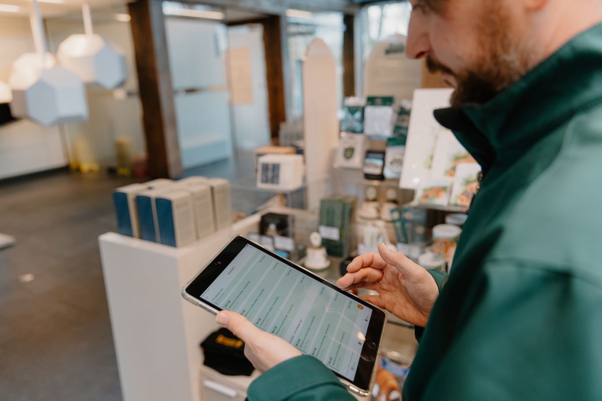 Visitor Service manager using digital technology in gift shop