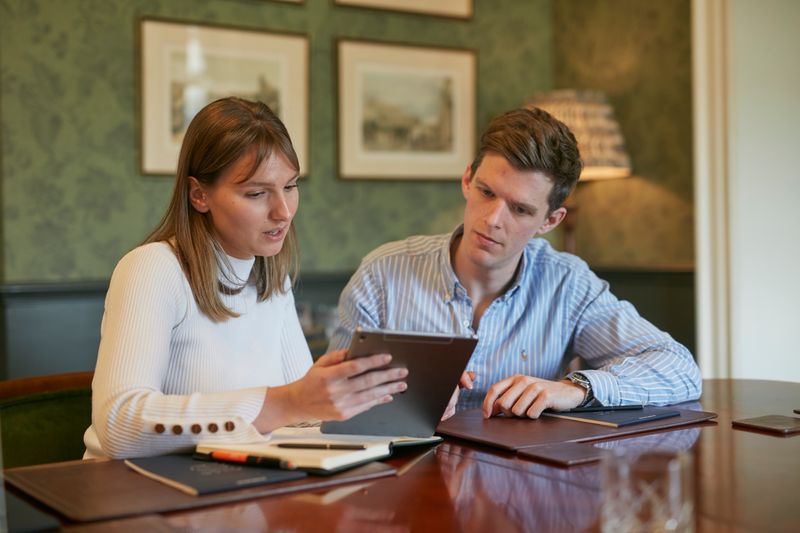 Couple monitoring social media